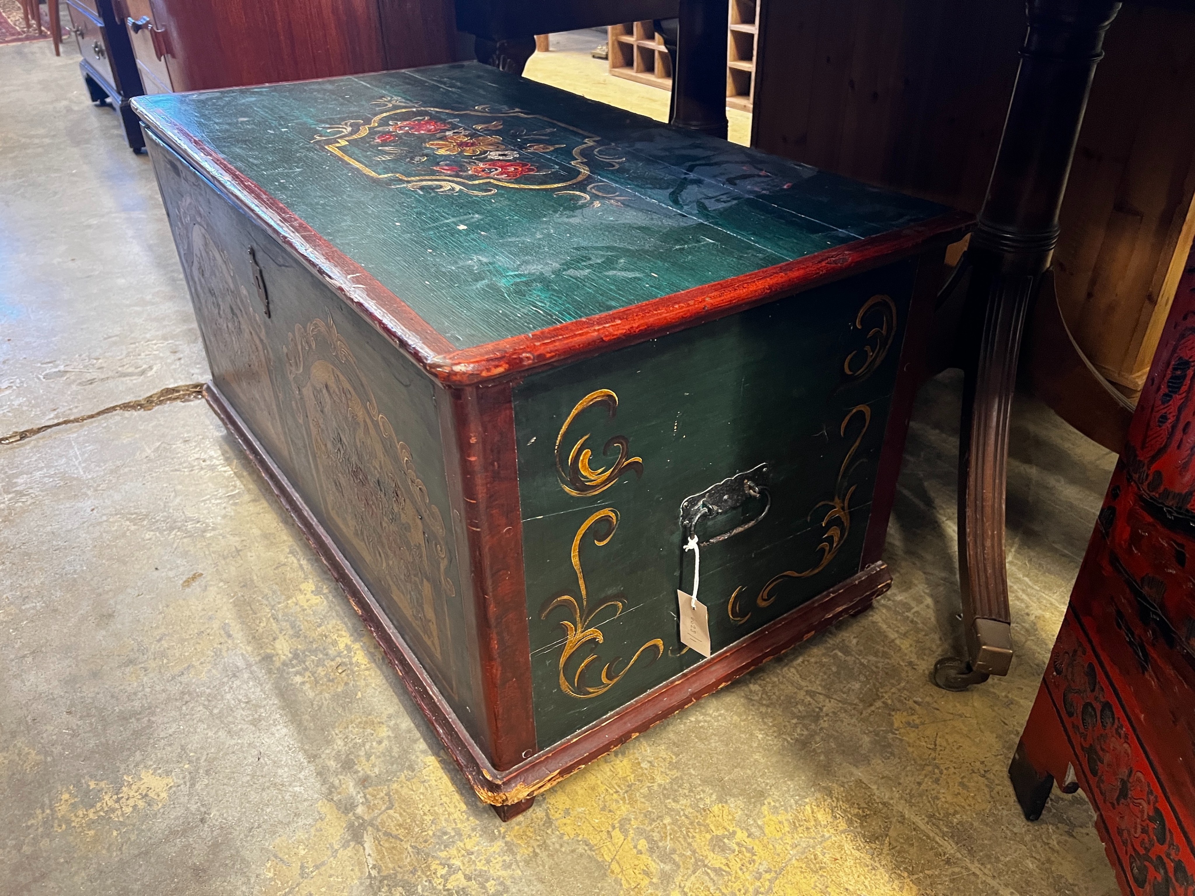 A 19th century Tyrolean style painted pine trunk, length 98cm, depth 54cm, height 50cm
